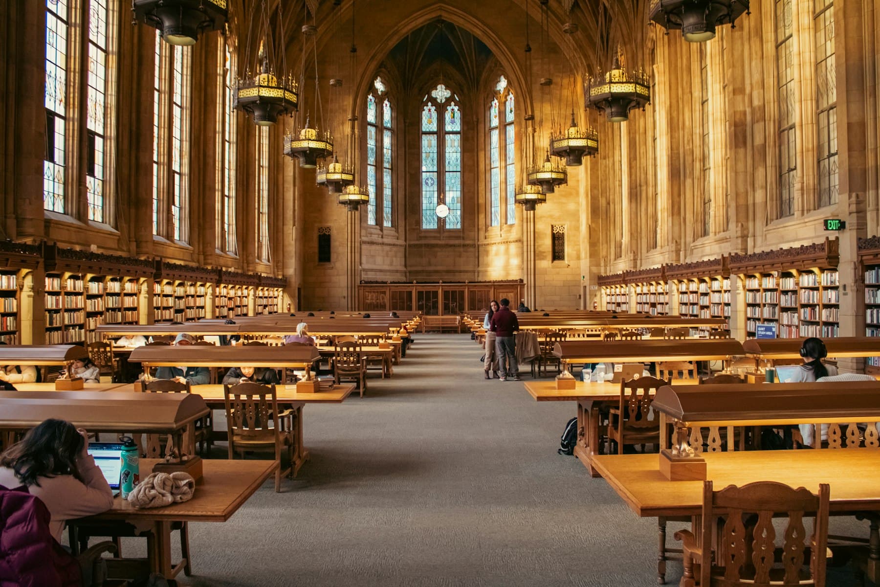 Students and faculty collaborating in a university setting.